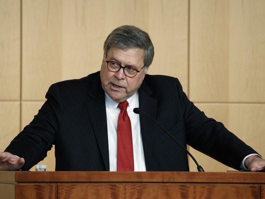 caption: Attorney General William Barr speaks at an event in Washington earlier this month. On Monday, he issued a proposed rule seeking to allow the federal government collect DNA samples from more than 740,000 immigrants every year.
