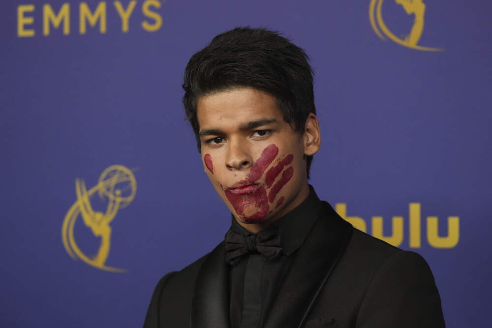 caption: D'Pharaoh Woon-A-Tai poses for a Red Carpet portrait at the 76th Emmy Awards. (Jordan Strauss/Invision for the Television Academy/AP)