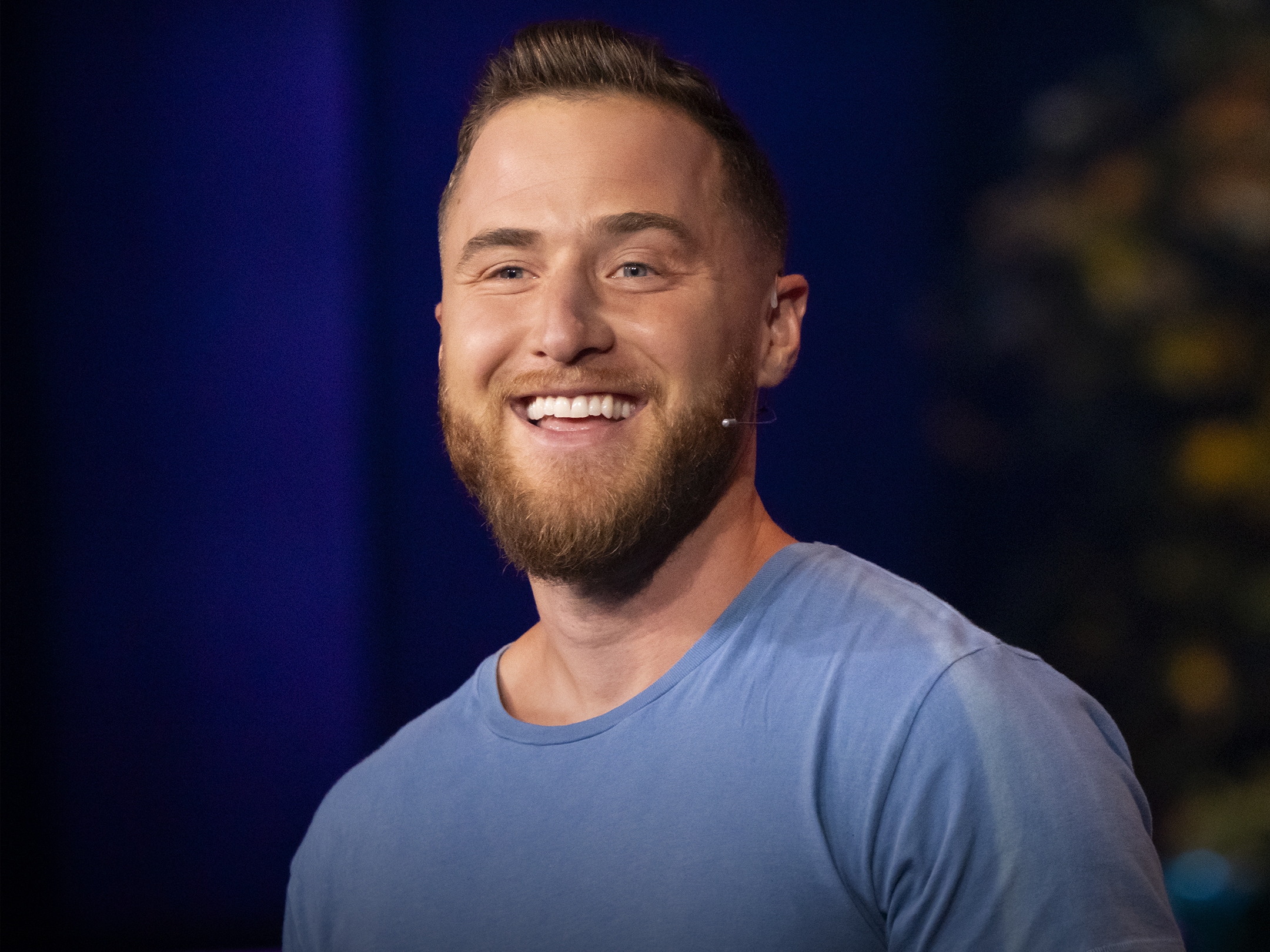 caption: Mike Posner speaks at TED Countdown Summit in Detroit, MI.