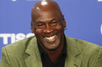 caption: Michael Jordan (pictured in January 2020) is celebrating his 60th birthday on Friday by making a $10 million donation to Make-A-Wish America.