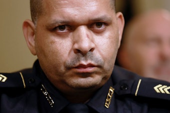 caption: U.S. Capitol Police Sgt. Aquilino Gonell testified last July before the U.S. House Select Committee investigating the Jan. 6 attack on the U.S. Capitol. Authorities say some 140 police officers were injured during the insurrection.