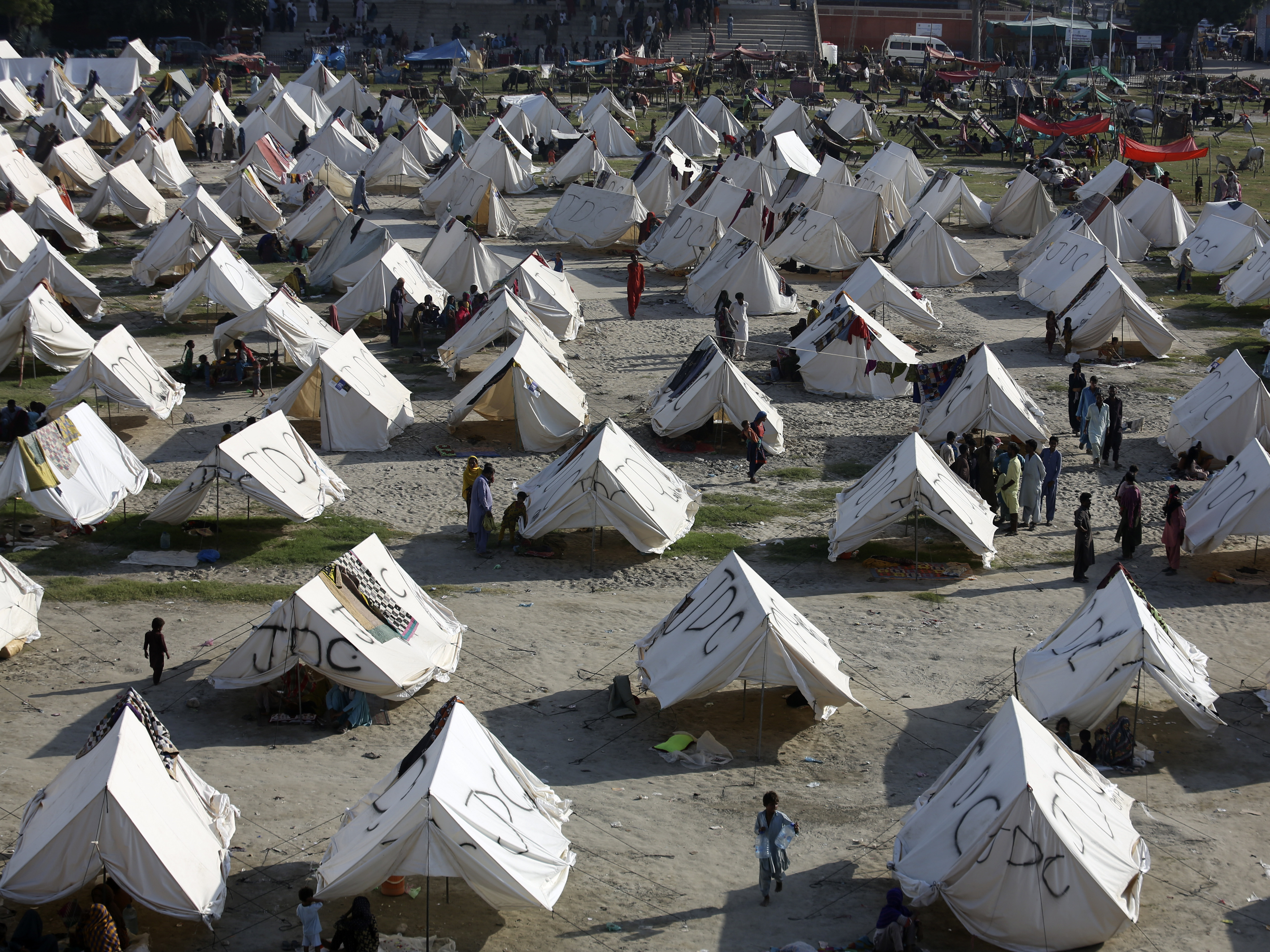 caption: Temporary housing is constructed for flood victims, in Larkana District, of Sindh, Pakistan, Thursday, Sept. 8, 2022.