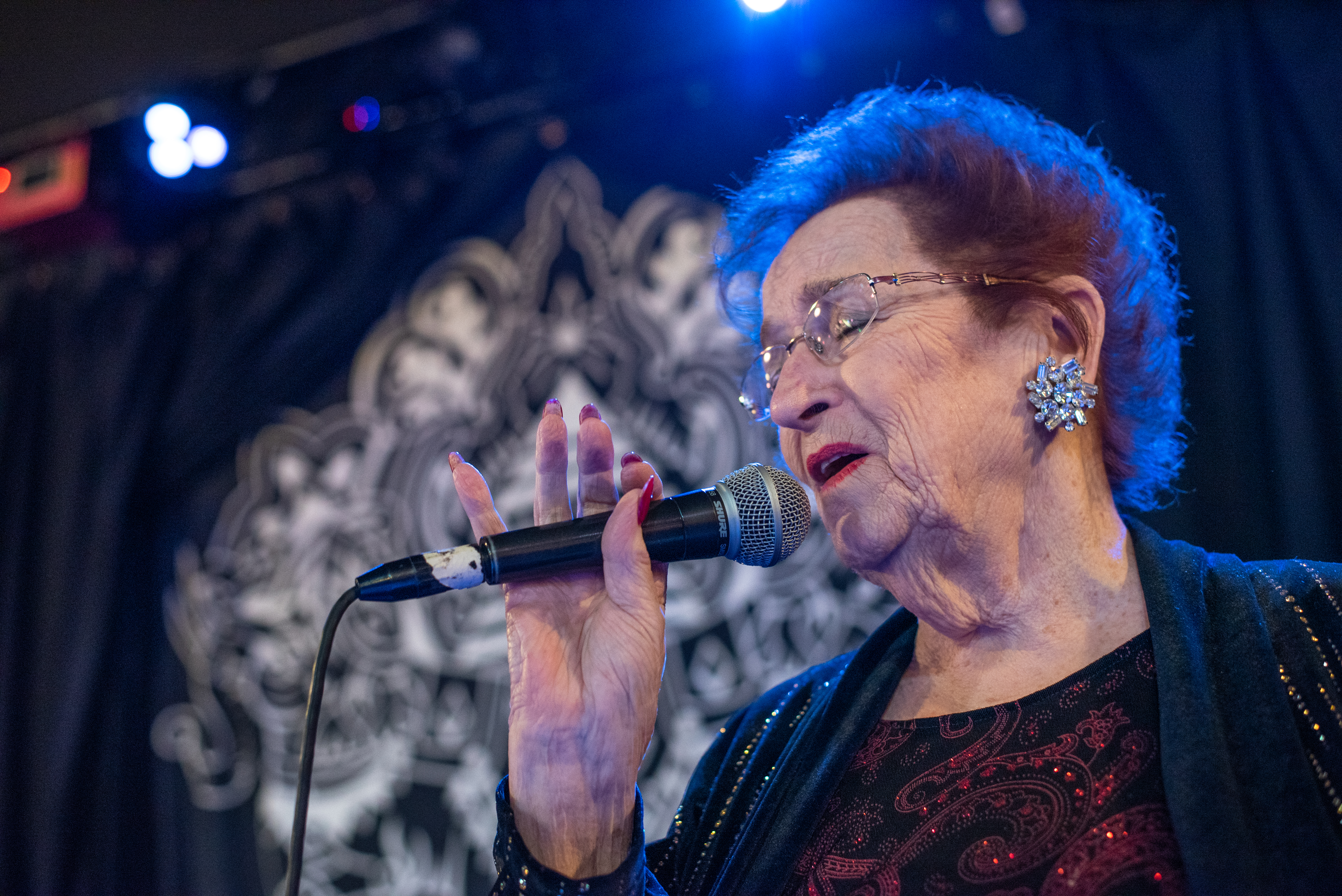 caption:  Mary Lou Gnoza performs at The Emerald of Siam, along with bandmates Stevie Haberman and Gary Danielson, on Feb. 10 in Richland, WA