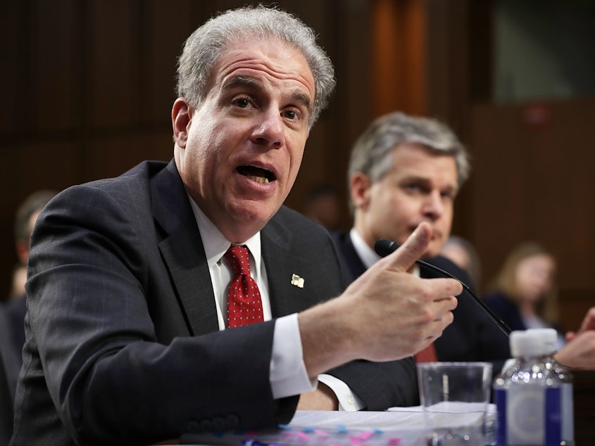 caption: Justice Department Inspector General Michael Horowitz, pictured during a Senate Judiciary hearing in June, has released his office's report on the Russia investigation.