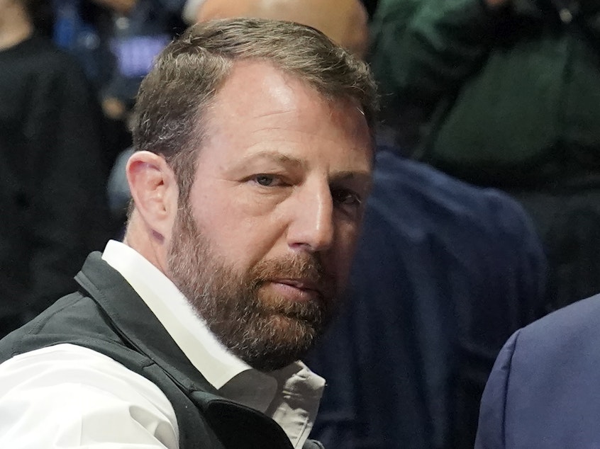 caption: Sen. Markwayne Mullin, R-Okla., is shown attending the NCAA Wrestling Championships, on March 18, 2023, in Tulsa, Okla.