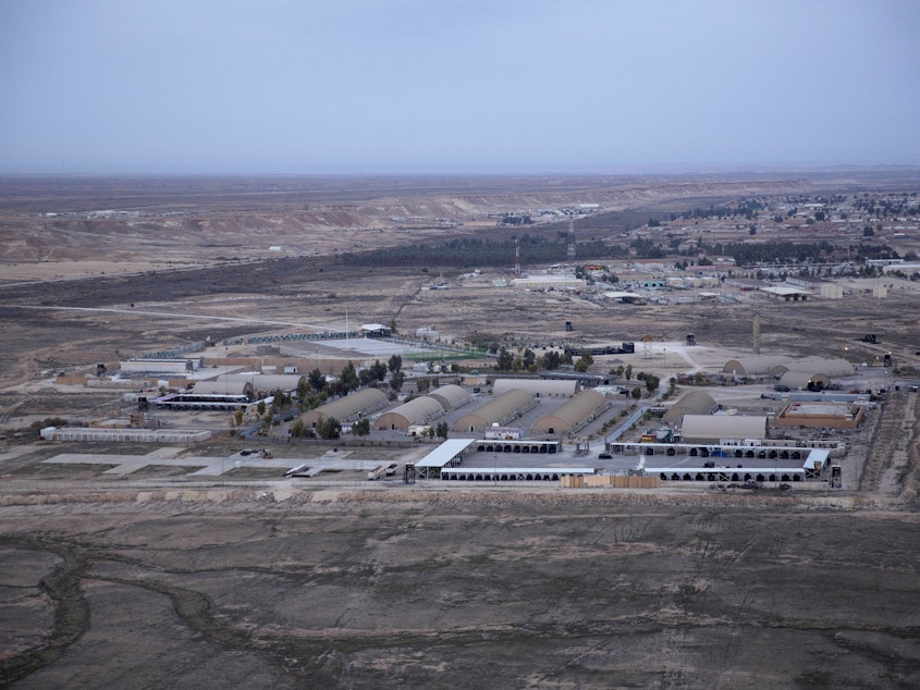 caption: This aerial photo shows Ain al-Assad air base in the western Anbar desert, Iraq, in December 2019.