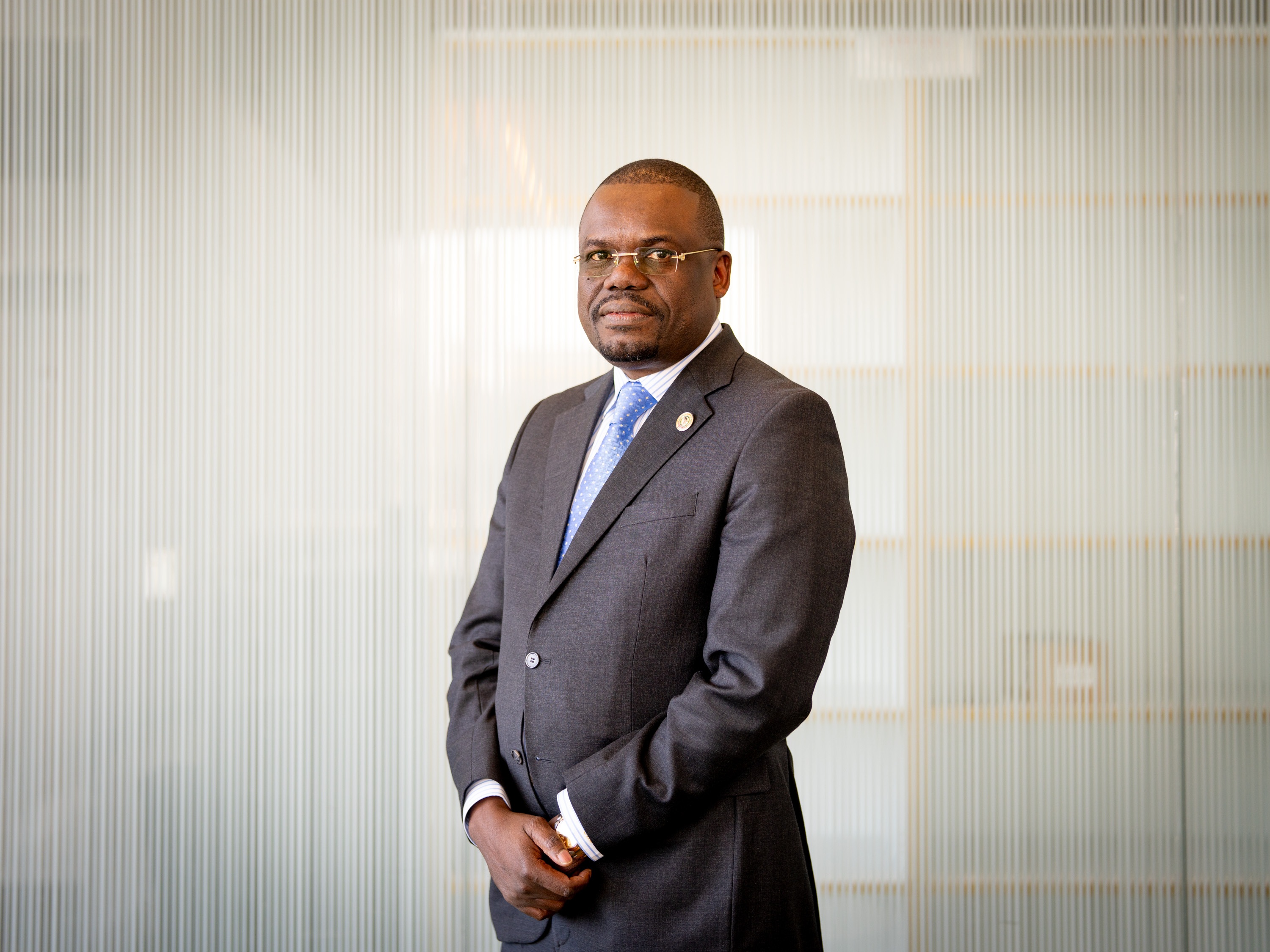 caption: Dr. Jean Kaseya, director general of the Africa Centres for Disease Control and Prevention, photographed at NPR headquarters during a visit to Washington, D.C., in March. In the wake of the Trump administration's foreign aid cuts, he tells colleagues: "It's like you are a child. You had a wealthy father. One day, you wake up and they say, 'Oh, your father had an accident. He passed on.' Then you have to survive. You have to find a way to survive."