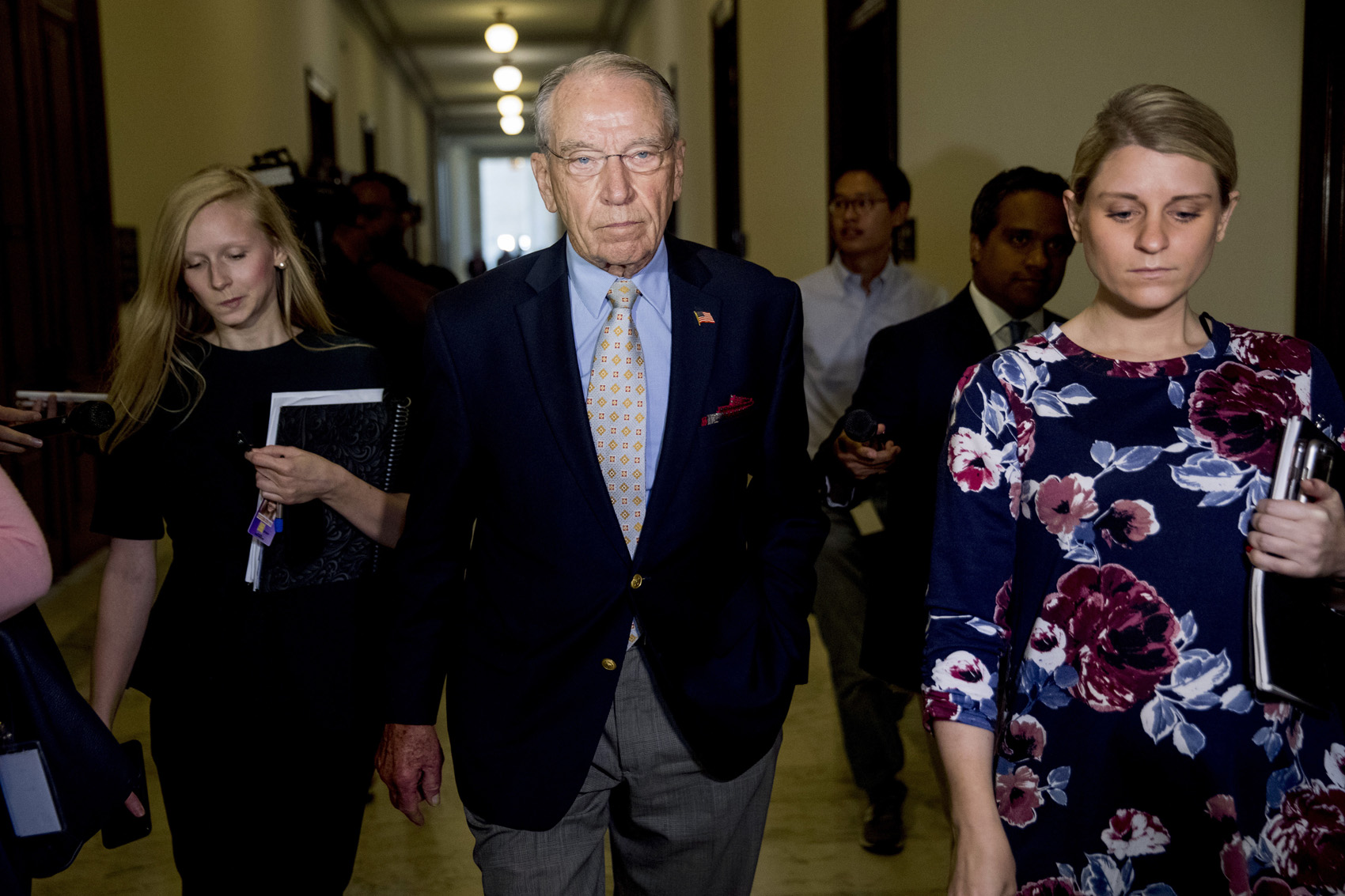 caption: Senate Judiciary Committee Chairman Chuck Grassley, R-Iowa, departs after speaking to reporters on Capitol Hill, Wednesday, Sept. 19, 2018, in Washington. Christine Blasey Ford wants the FBI to investigate her allegation that she was sexually assaulted by Supreme Court nominee Brett Kavanaugh before she testifies at a Senate Judiciary Committee hearing next week. (AP Photo/Andrew Harnik)