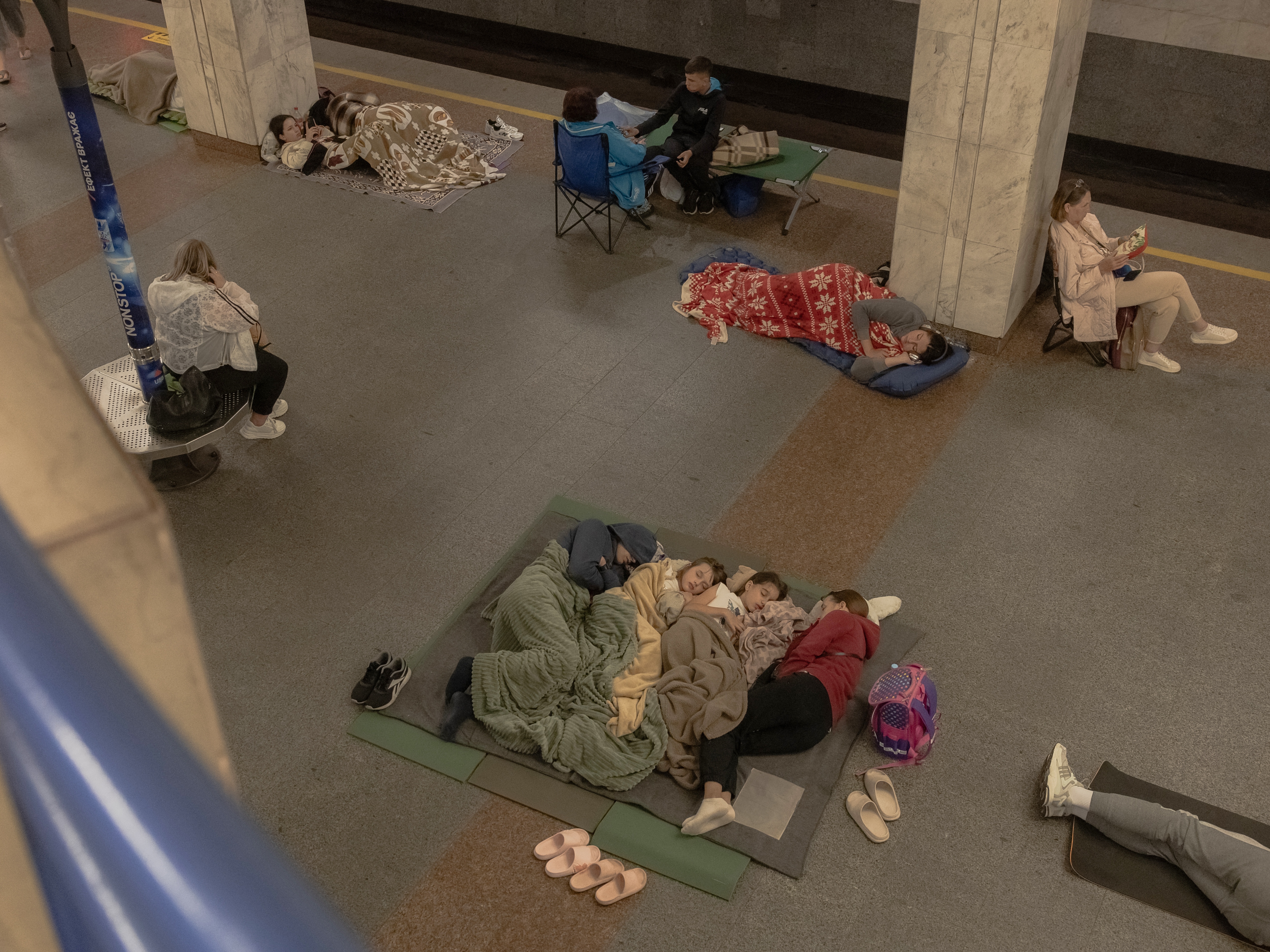 caption: Ukrainians take shelter in a subway station in Kyiv early Thursday as Russia unleashed one of its largest airstrikes of the war. Russia fired more than 600 drones and missiles, according to the Ukraine military. Most targeted western Ukraine, where a U.S. electronics factory was hit.