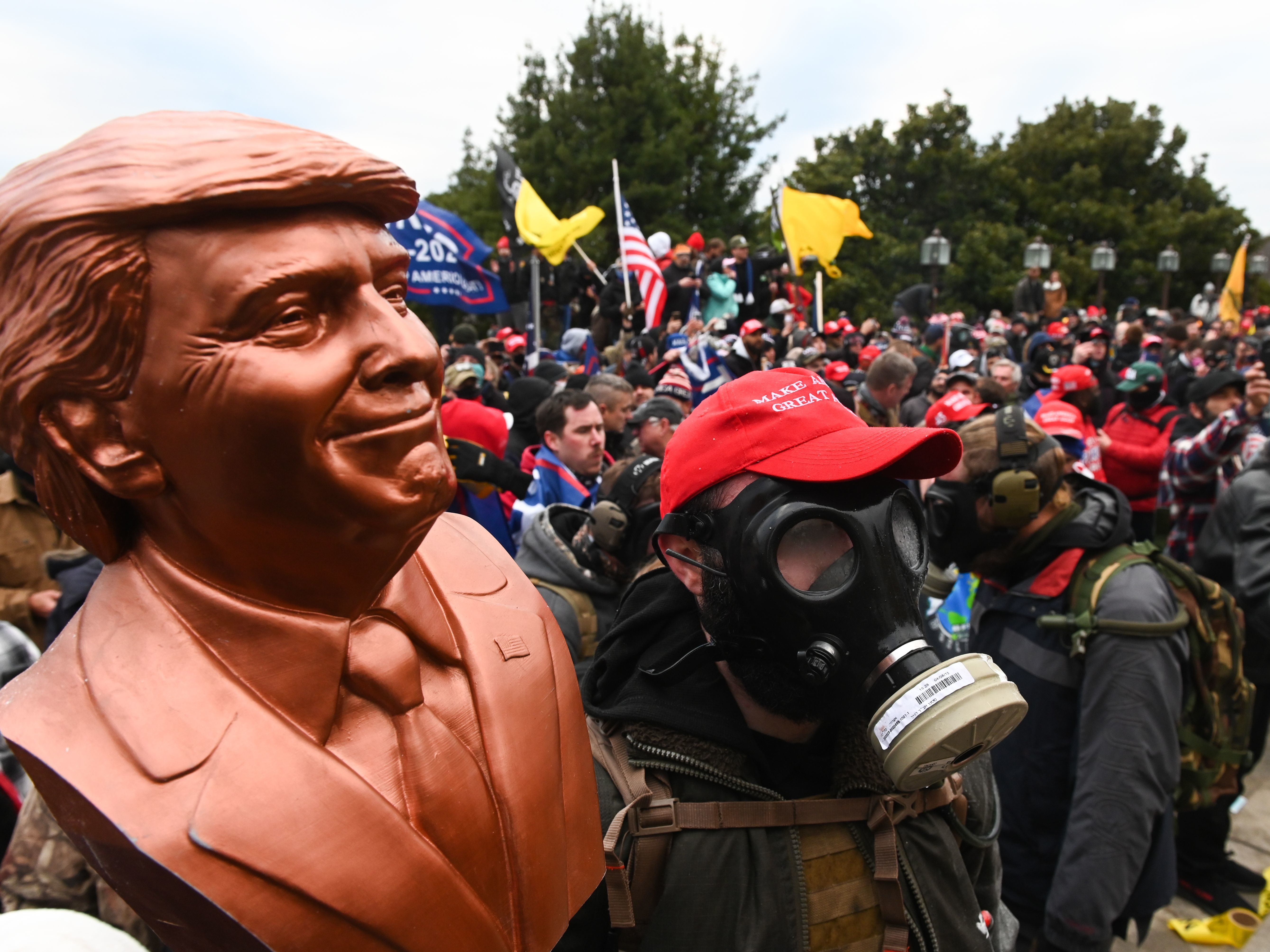 caption: Alleged members of several different right-wing and extremist groups are facing charges in connection with the Jan. 6 siege at the U.S. Capitol.