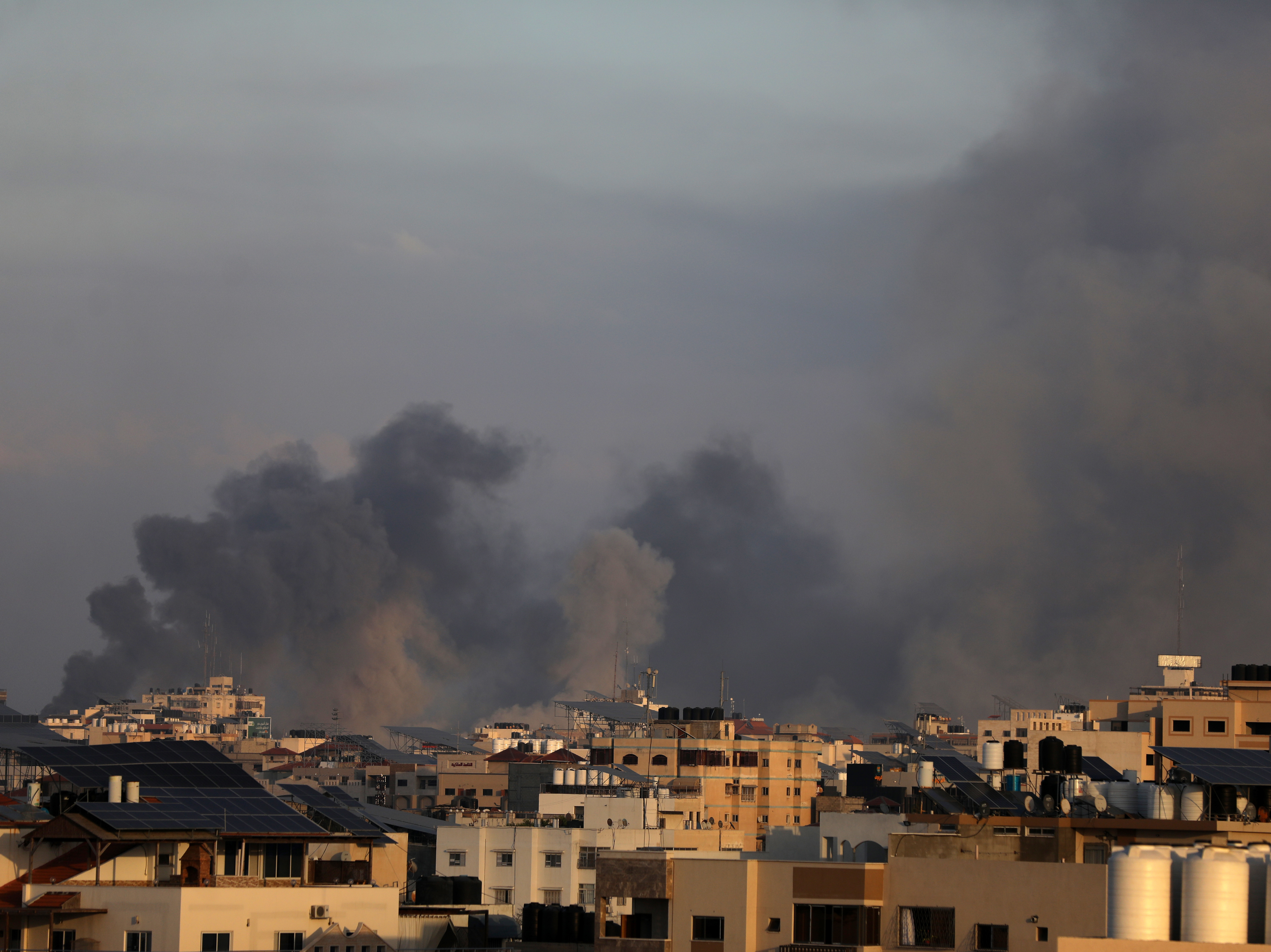 caption: Smoke billows during Israeli strikes on Gaza City on Tuesday.