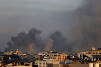 caption: Smoke billows during Israeli strikes on Gaza City on Tuesday.