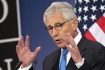 caption: Chuck Hagel, then U.S. secretary of defense, speaks during a media conference at NATO headquarters in Brussels in 2015.
