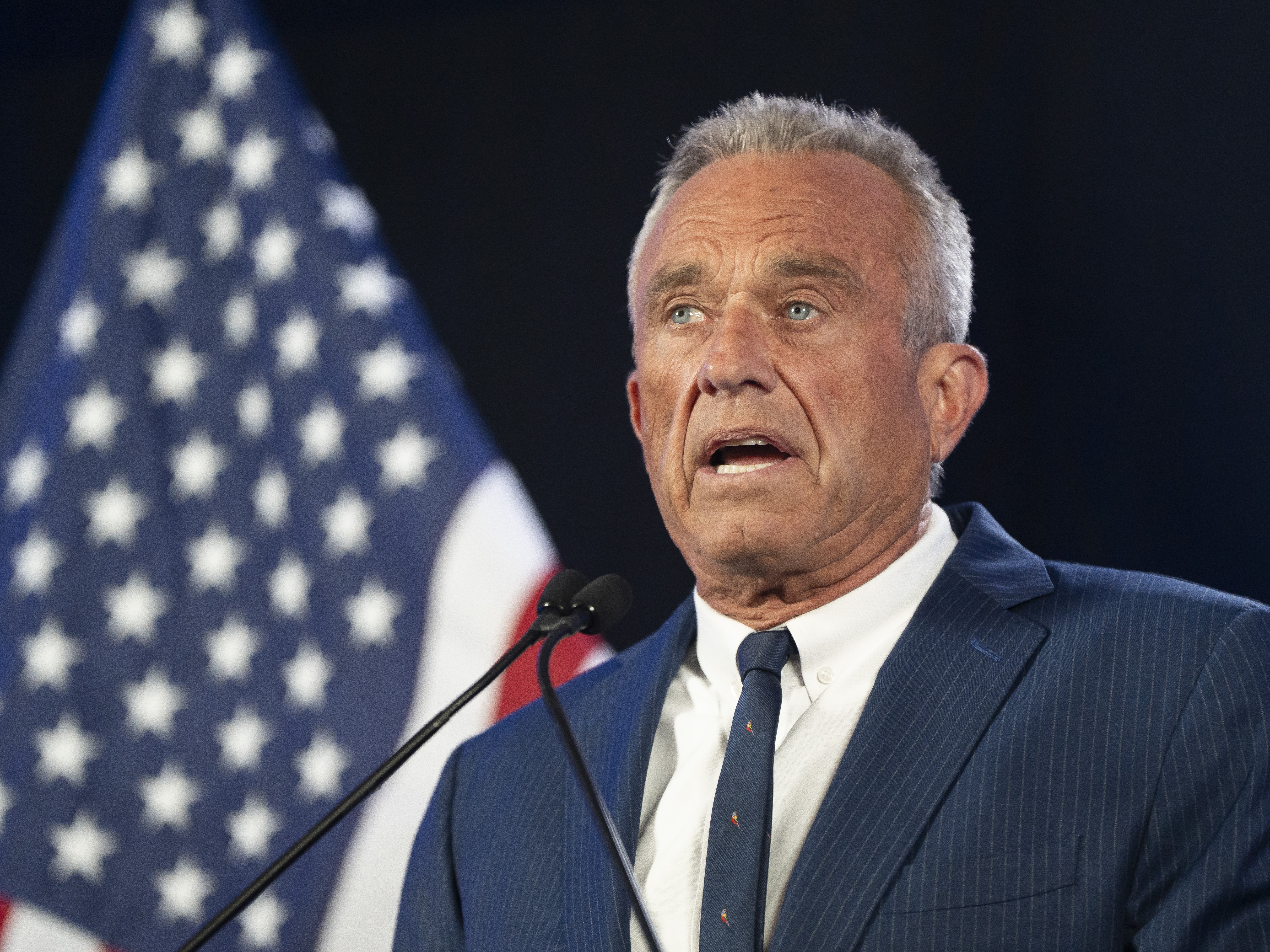 caption: Robert F. Kennedy Jr. speaks at the Renaissance Phoenix Downtown Hotel on August 23, 2024, in Phoenix, Arizona. President Trump has nominated Kennedy to lead the the U.S. Department of Health and Human Services.