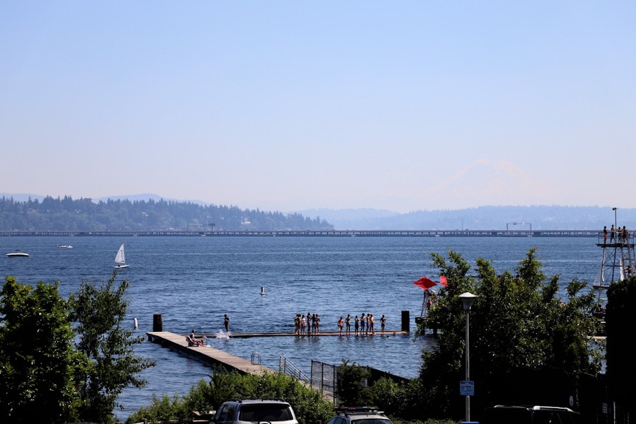 caption: A view of the docks at Laurelhurst Beach Club on Monday, June 28, 2021, on a record breaking day for temperature in Seattle. The mercury reached 107 degrees.