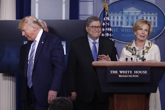 caption: President Trump turns away from Dr. Deborah Birx, White House coronavirus response coordinator, as she says she had a low-grade fever over the weekend and was tested for coronavirus.