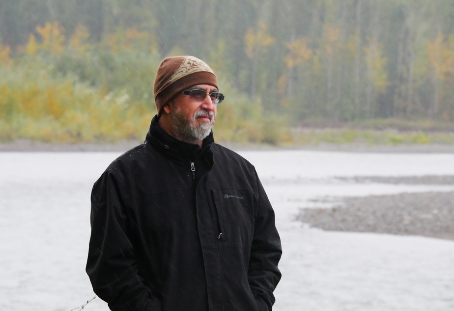 Caption: Ross Cline Jr., Planning Director for the Nooksack Tribe in front of the Nooksack River