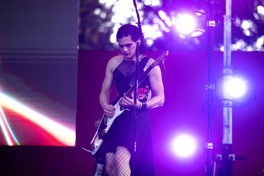 caption: Sam, guitarist with the band Gender Envy, performs during Trans Pride Seattle on Friday, June 23, 2023, at Volunteer Park in Seattle. 