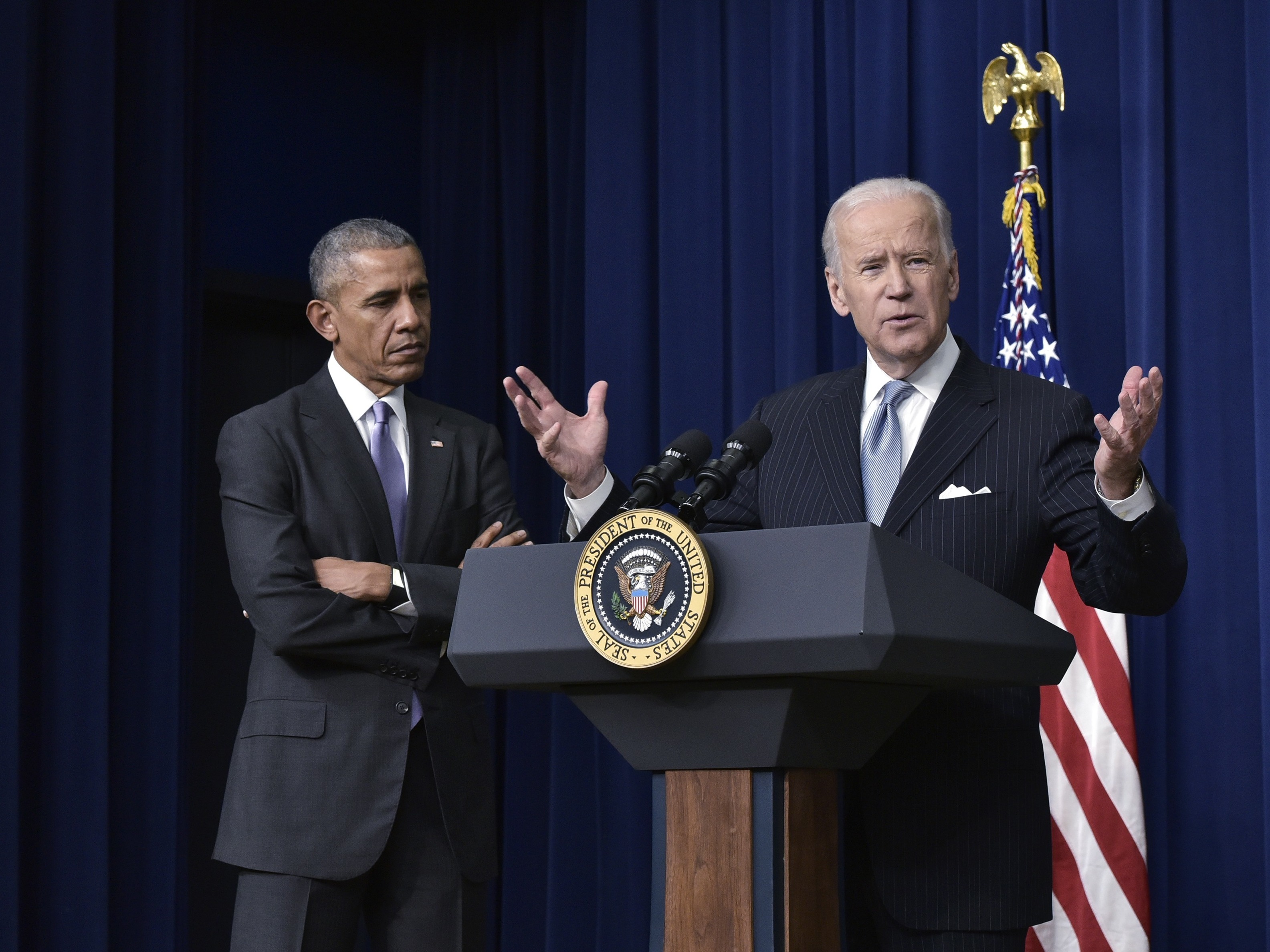 caption: Joe Biden and Barack Obama during a signing ceremony in 2016. The former president took part in a virtual fundraiser Tuesday for his former vice president.