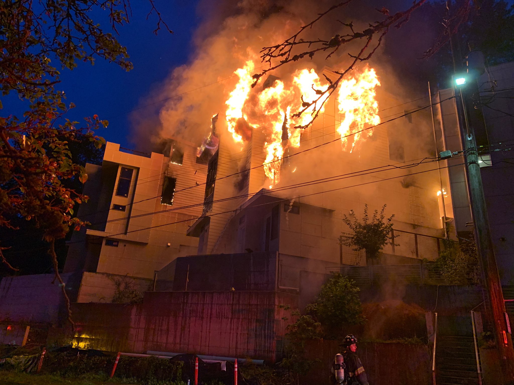 caption: The fire on Beacon Hill appeared to have started in a building under construction and spread to neighboring buildings. 