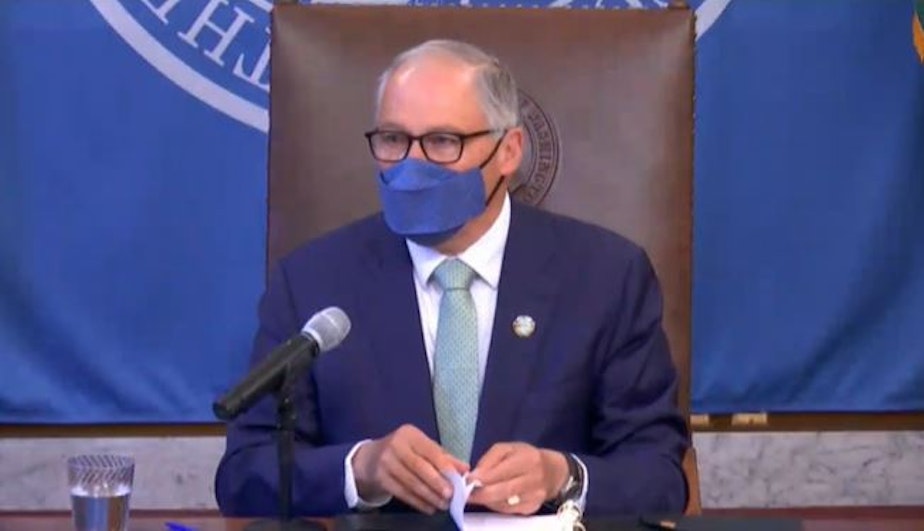 caption: Washington Gov. Jay Inslee announces that no counties will phase down for two weeks, May 4, 2021. 