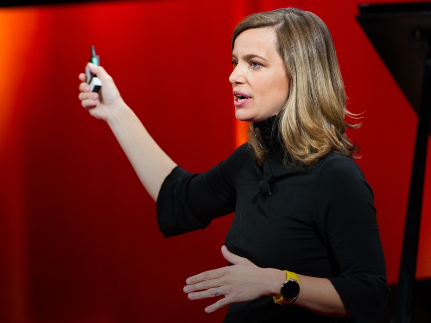 caption: Kate Orff on the TED stage
