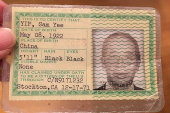 caption: The author's maternal grandfather's green card. His birthday is listed as two years before he was actually born. 