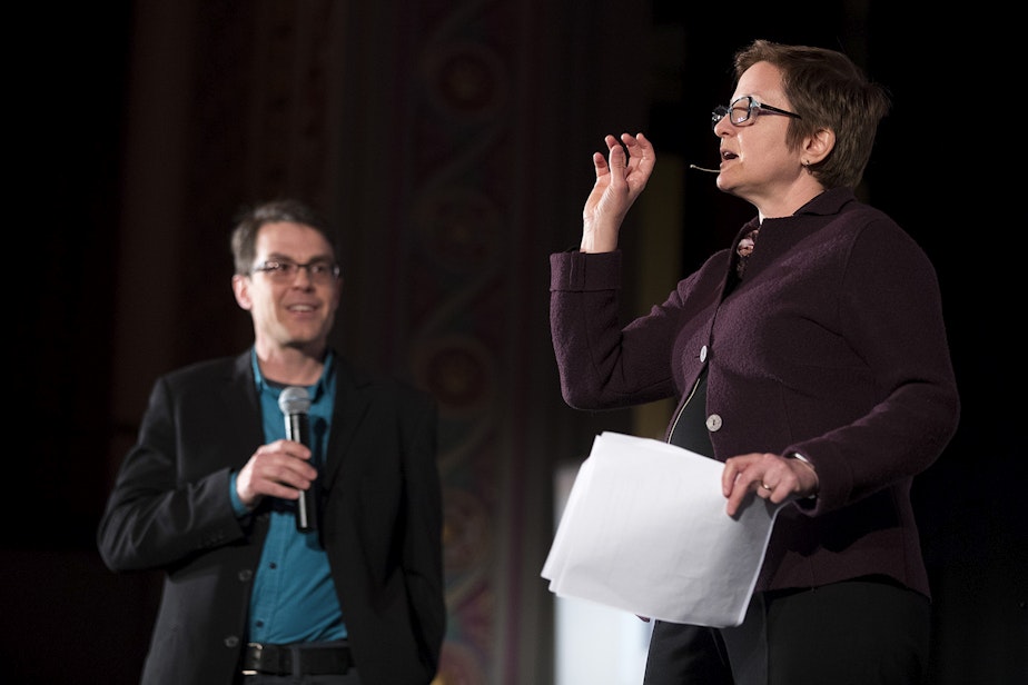 caption: KUOW reporters Joshua McNichols and Carolyn Adolph host 'That's Debatable: Amazon is Good for Seattle' on Wednesday, March 7, 2018, in Seattle. 