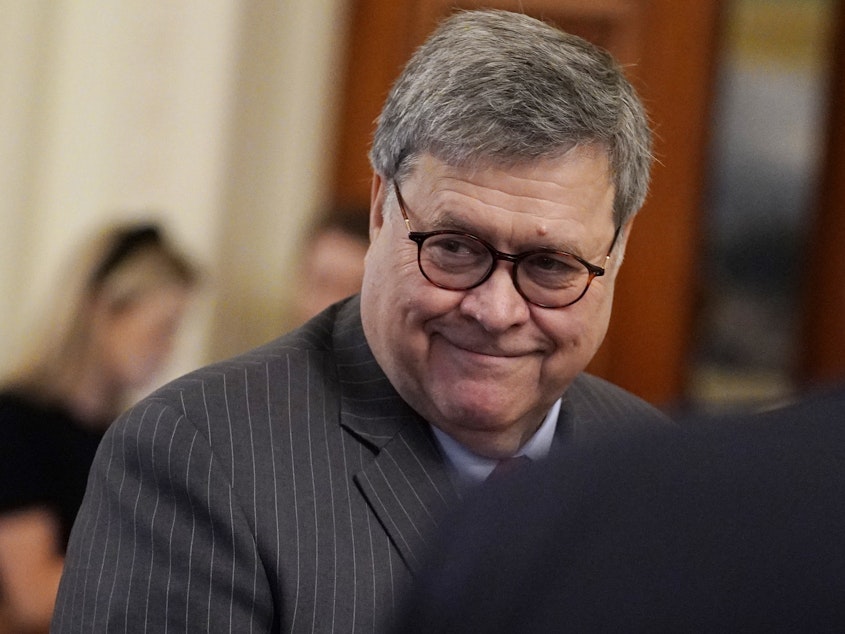 caption: Attorney General William Barr arrives to hear President Donald Trump speak in the East Room of the White House, Thursday, Feb. 6, 2020.