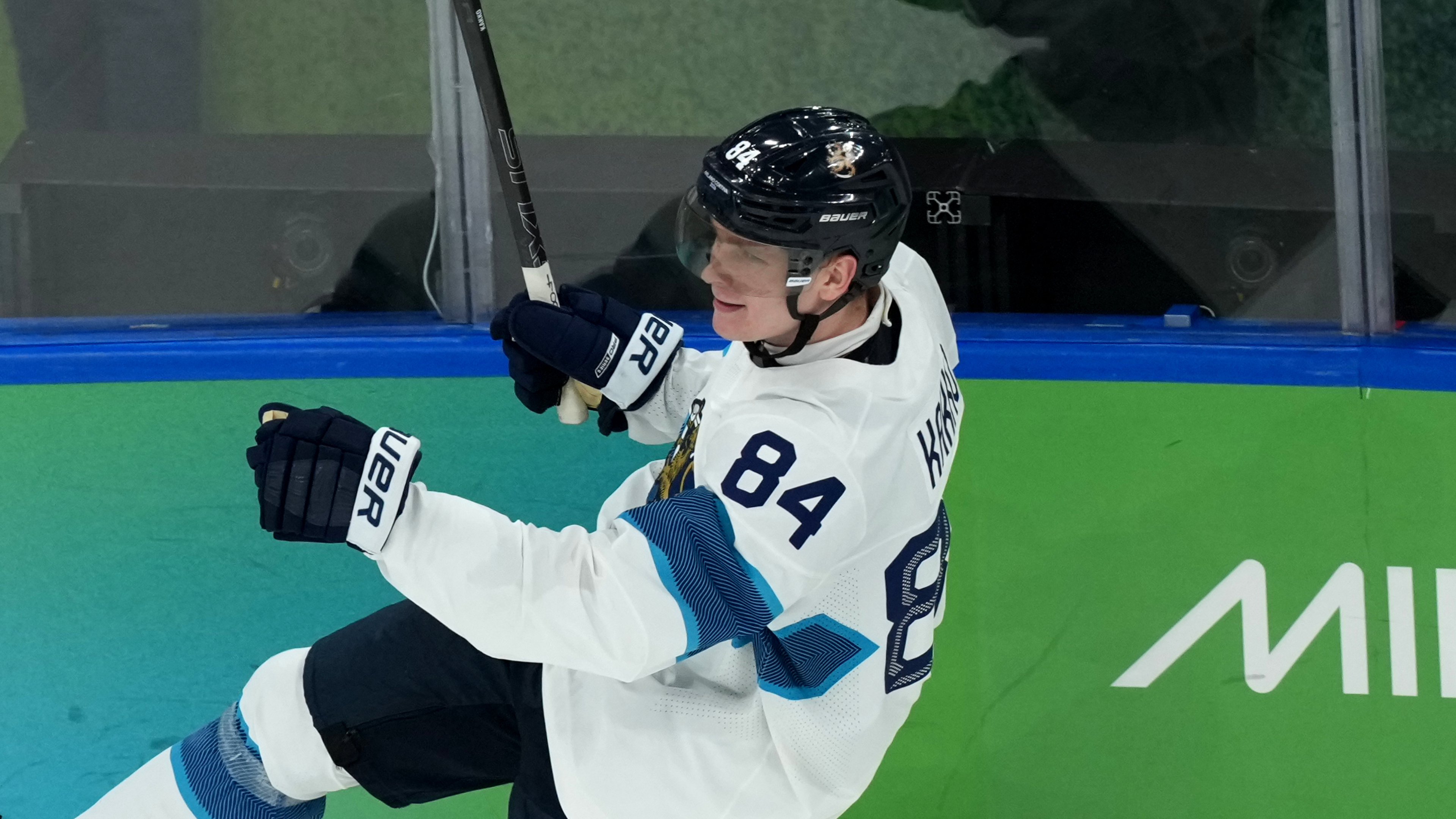 caption: Finland's Kaapo Kakko celebrates after scoring a goal against Slovakia during the third period of the men's ice hockey bronze medal game at the 2026 Winter Olympics in Milan, Italy, Saturday, Feb. 21, 2026.