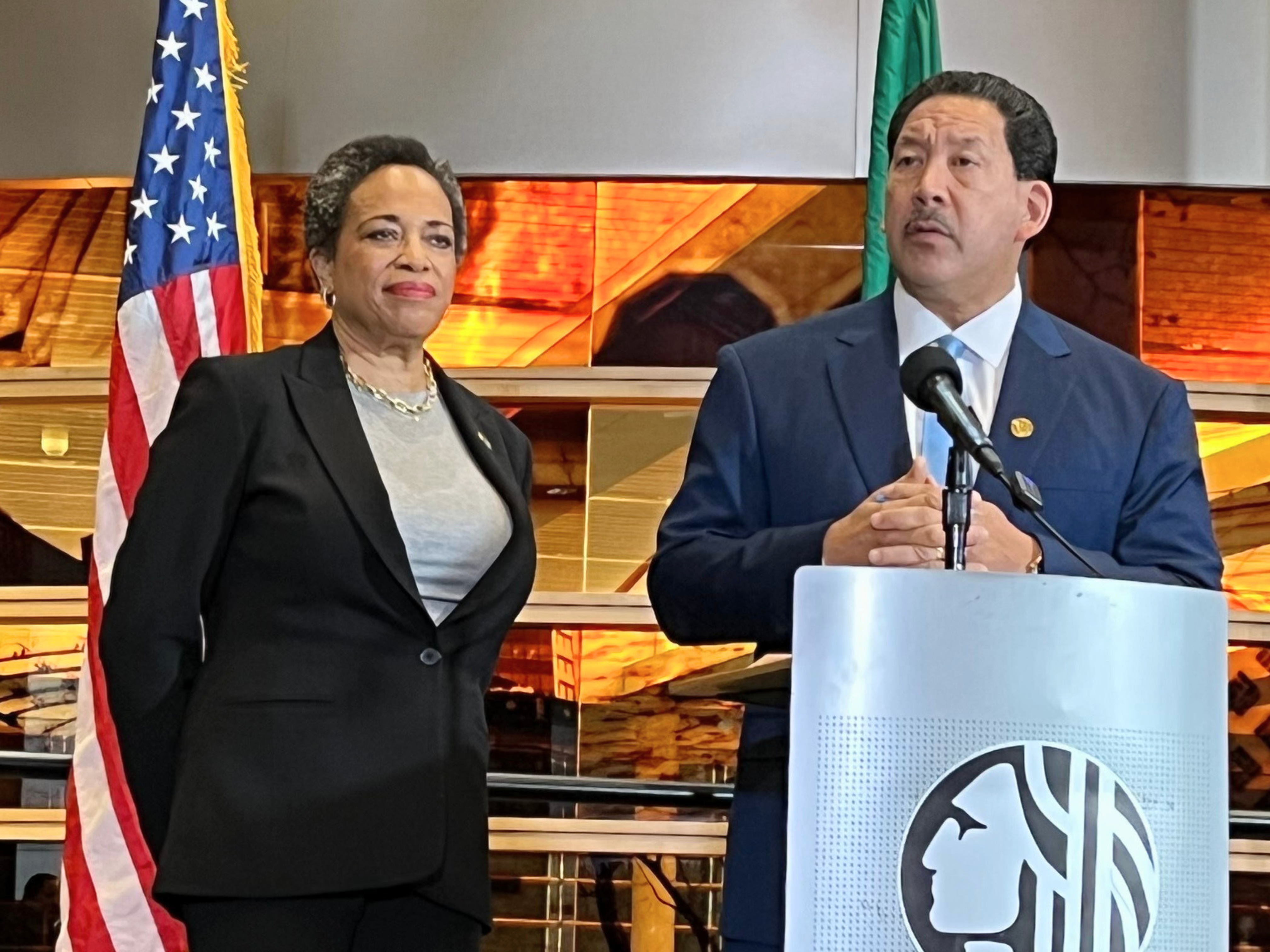 caption: Seattle Mayor Bruce Harrell, with his wife Joanne at his side, conceded the mayoral race to challenger Katie Wilson Thursday at City Hall in Seattle.