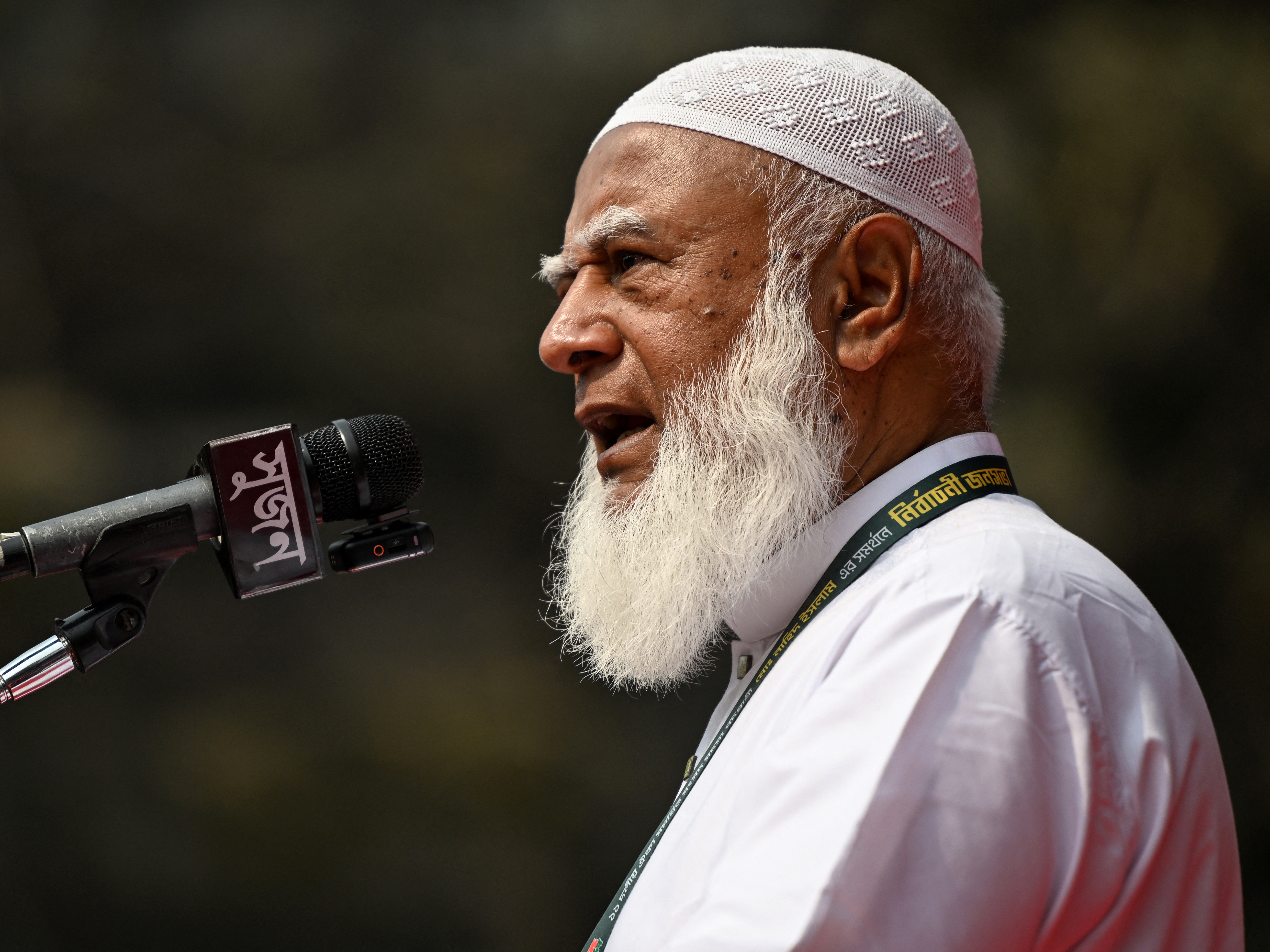 caption: Shafiqur Rahman, the leader of the Jamaat-e-Islami party, speaks during a Jamaat-led alliance rally in Dhaka, Bangladesh, on Feb. 8.