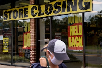 caption: A store displays a sign before closing down permanently following the impact of the coronavirus pandemic, on Aug. 4, 2020 in Arlington, Va. The Small Business Administration's inspector general office said billions of dollars in relief loans may have been handed out to fraudsters or ineligible applicants.