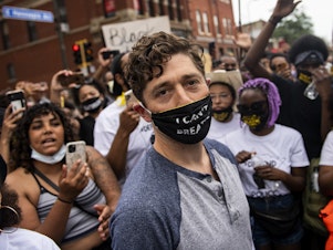 caption: Minneapolis Mayor Jacob Frey was met with boos from protestors in his city last summer after saying he didn't support abolishing the police.
