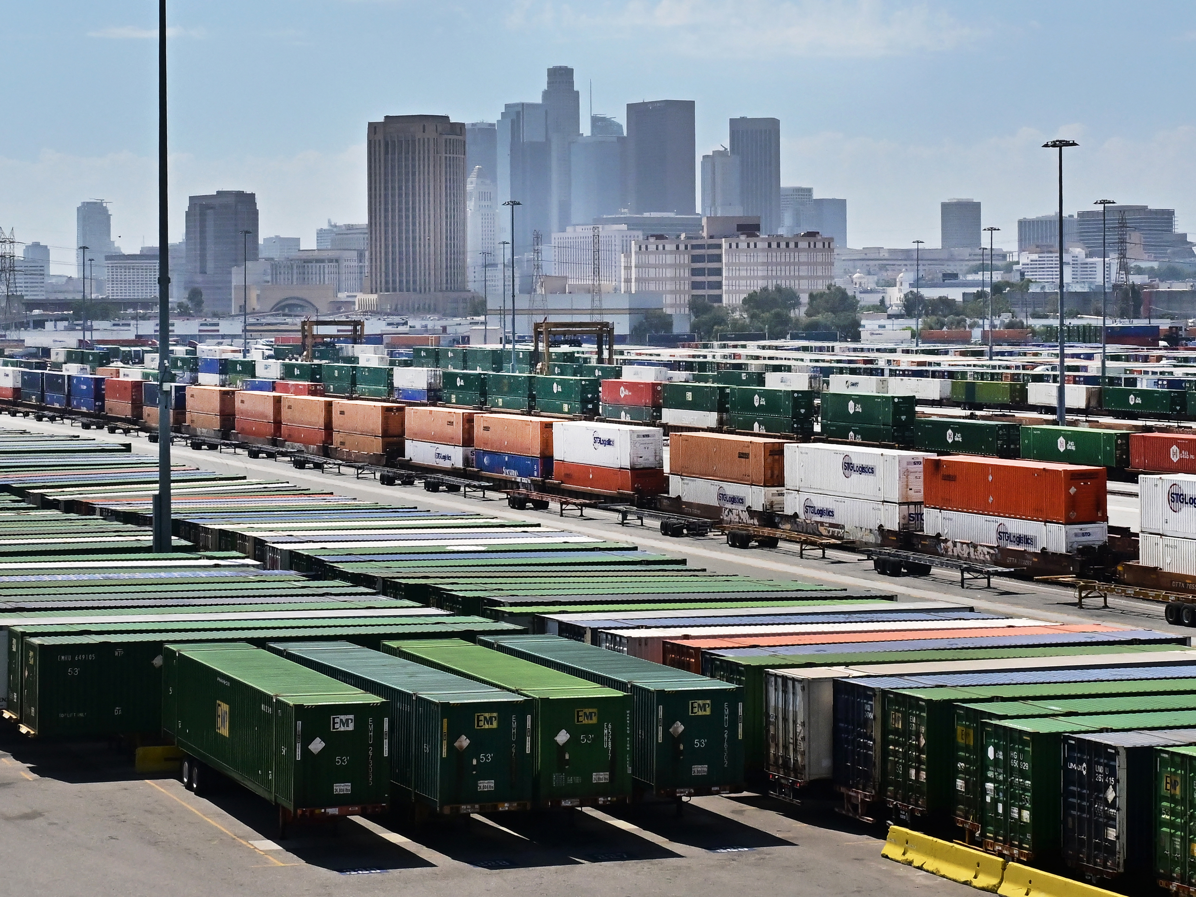 caption: Shipping containers at a Los Angeles rail yard on Sept. 2, 2025, the day that President Trump said he would seek a swift ruling from the Supreme Court on his tariffs.