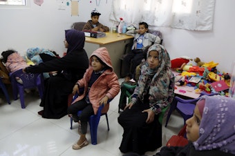 caption: Yemeni children diagnosed with cancer wait to receive treatment at an oncology ward of a hospital in Sana'a on February 4. A new study looks at the impact of COVID-19 on kids with cancer.