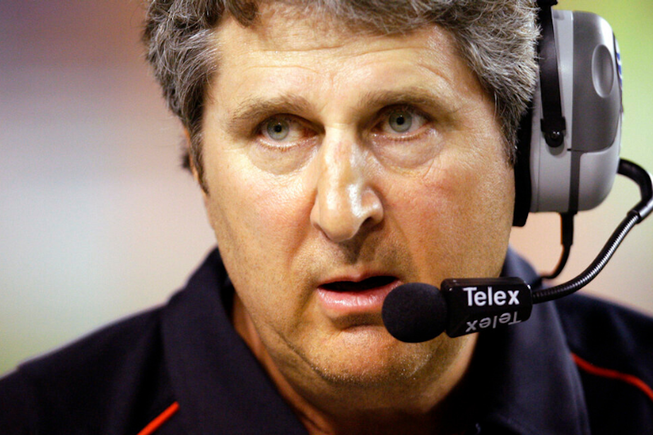 caption: Texas Tech coach Mike Leach waits as a play is reviewed during the first quarter of their NCAA college football game against Texas in Austin, Texas, Sept. 19, 2009. Mike Leach, the gruff, pioneering and unfiltered college football coach who helped revolutionize the passing game with the Air Raid offense, has died following complications from a heart condition, Mississippi State said Tuesday, Dec. 13, 2022. He was 61. 