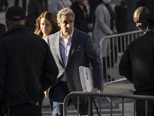 caption: Michael Cohen arrives for former President Donald Trump's civil business fraud trial at New York Supreme Court on Tuesday.