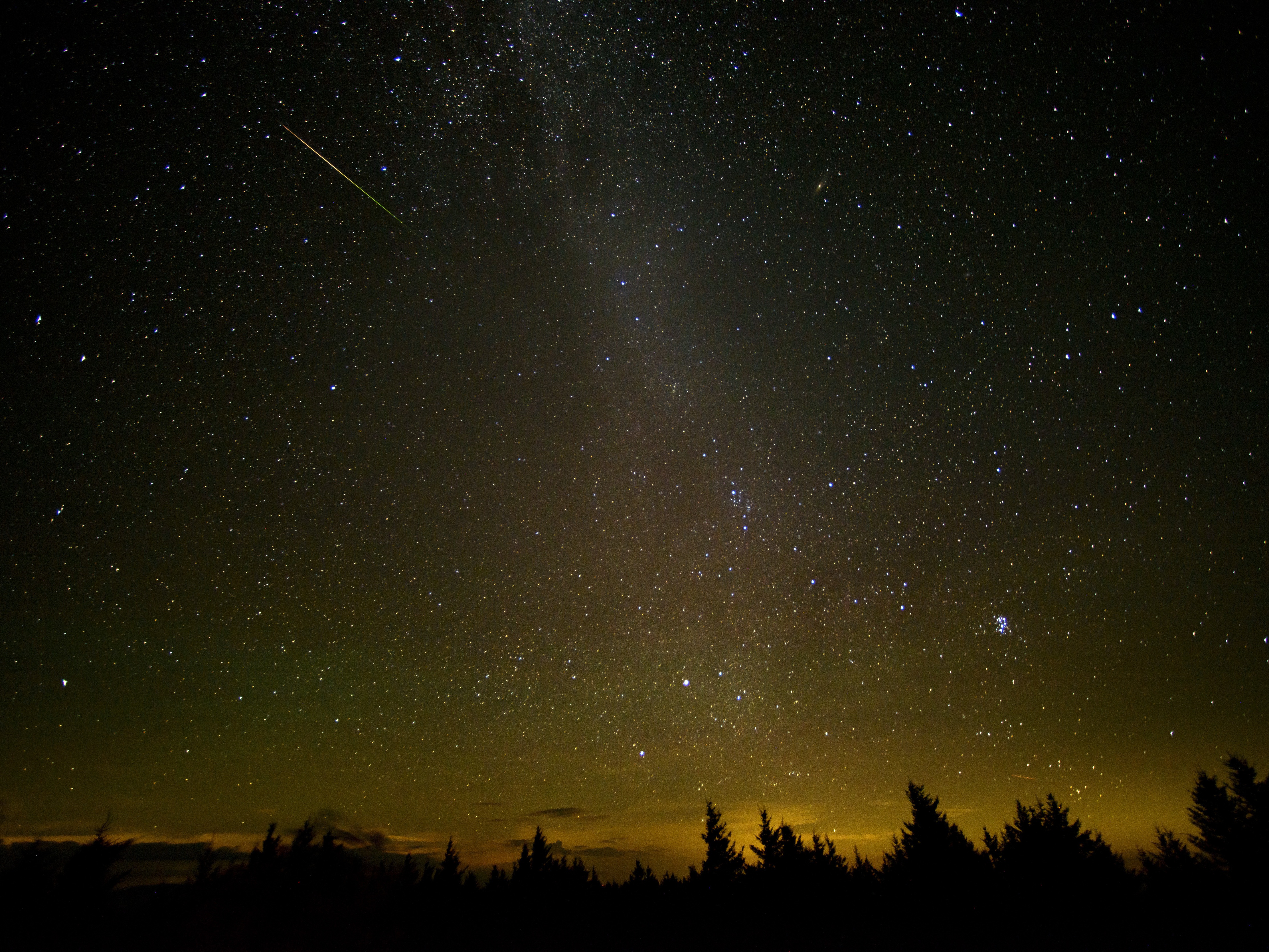 caption: In this 30 second exposure, a meteor streaks across the sky during the annual Perseid meteor shower Friday, Aug. 12, 2016 in Spruce Knob, W. Va.