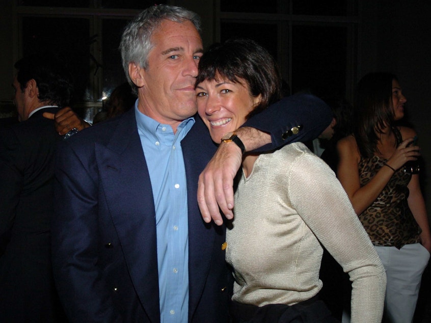 caption: Ghislaine Maxwell has been arrested on charges that she helped Jeffrey Epstein recruit underage girls for sexual abuse. The two are seen here in 2005.