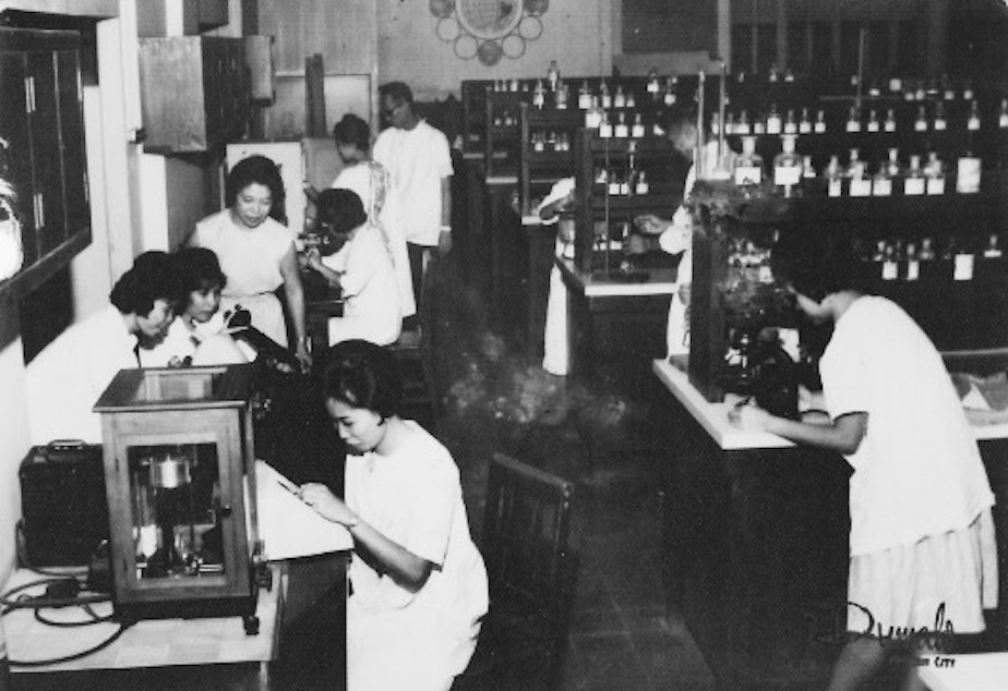 caption: Erlinda Conde in her college chemistry class.