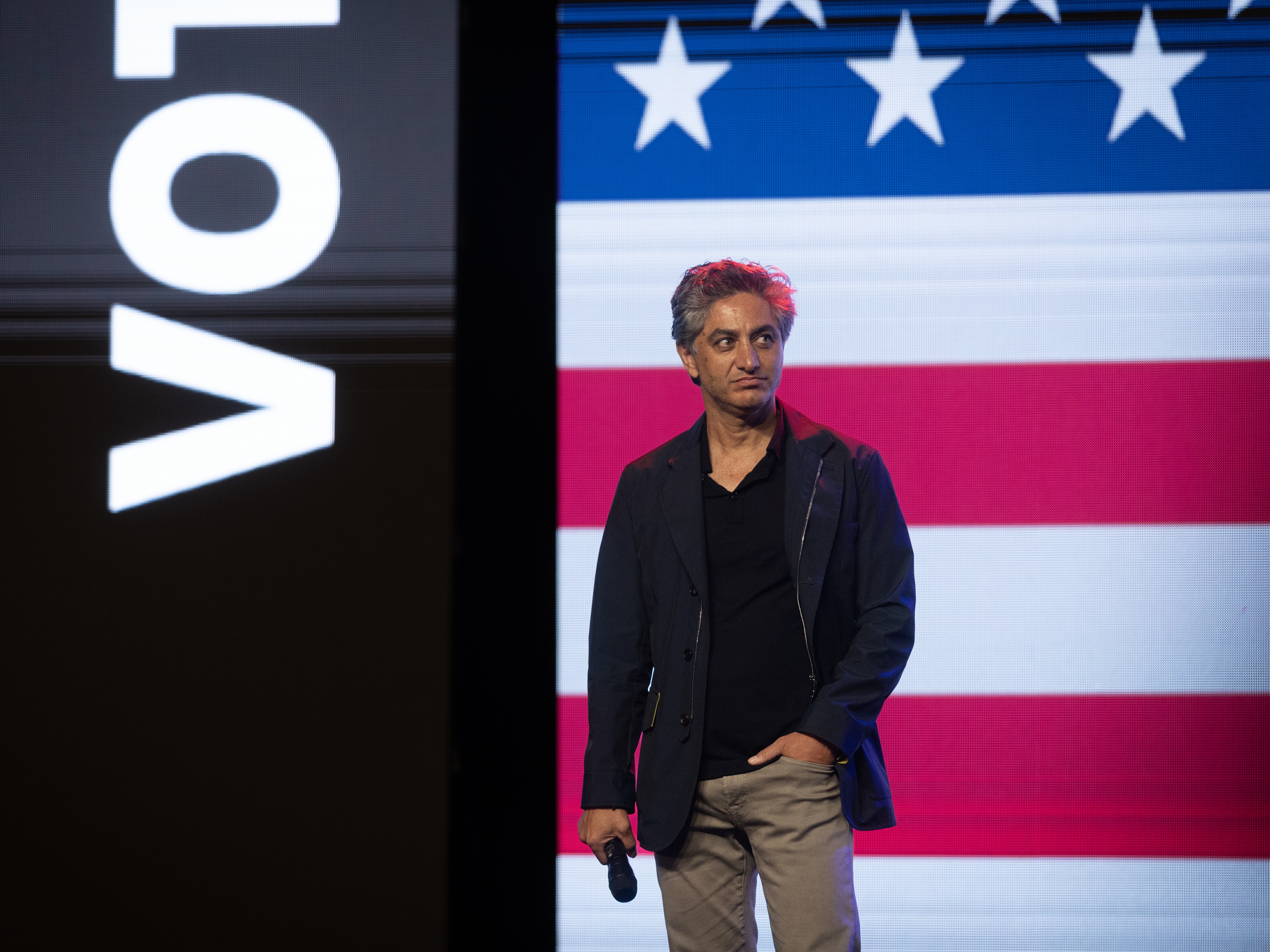 caption: Investor Antonio Gracias at a town hall with Elon Musk in Green Bay, Wis., on March 30. Gracias, who is part of Musk's Department of Government Efficiency team, has been working at the Social Security Administration.