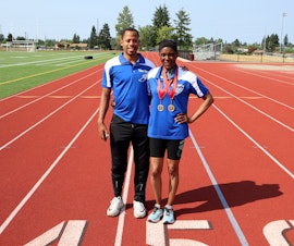 caption: Coach Marcus Chambers and senior masters athlete Madonna Hanna in Tacoma, Washington.