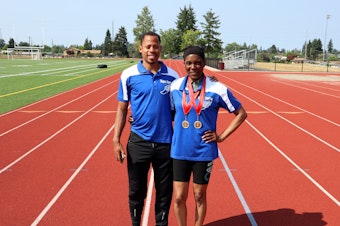 caption: Coach Marcus Chambers and senior masters athlete Madonna Hanna in Tacoma, Washington.