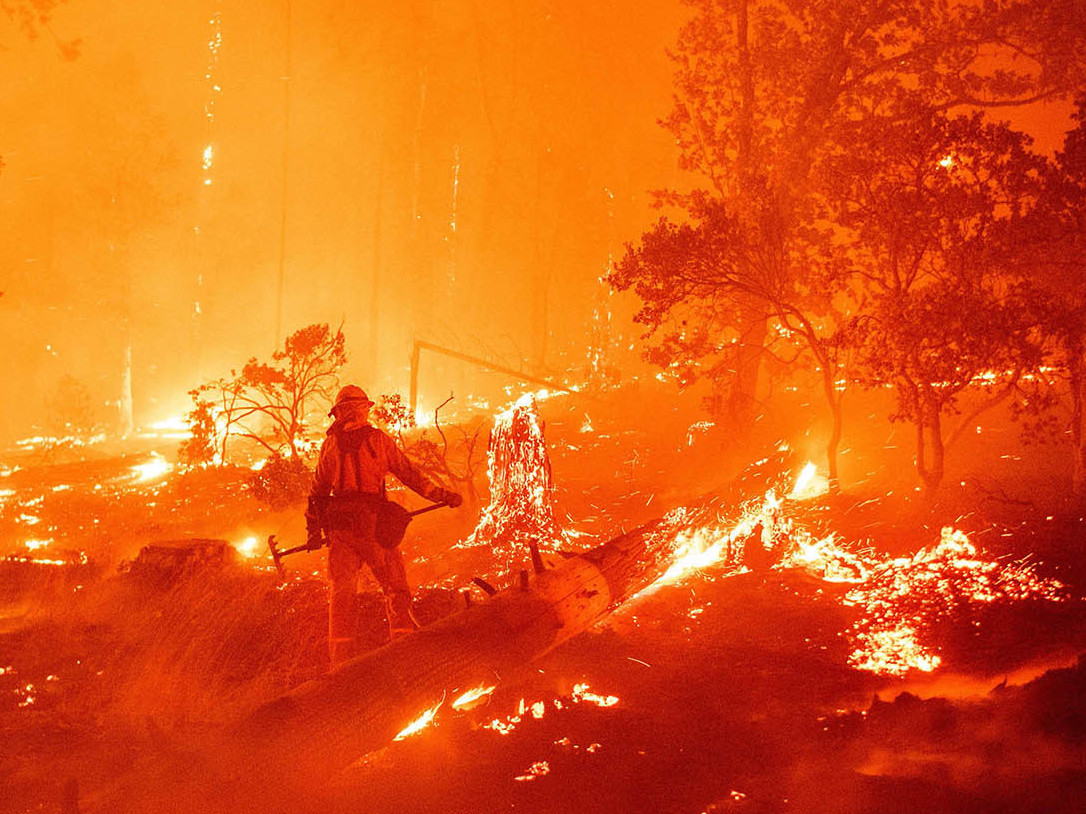 caption: Wildfires across the West, such as the Creek Fire here in Madera County, Calif., are pushing firefighters to their limits.