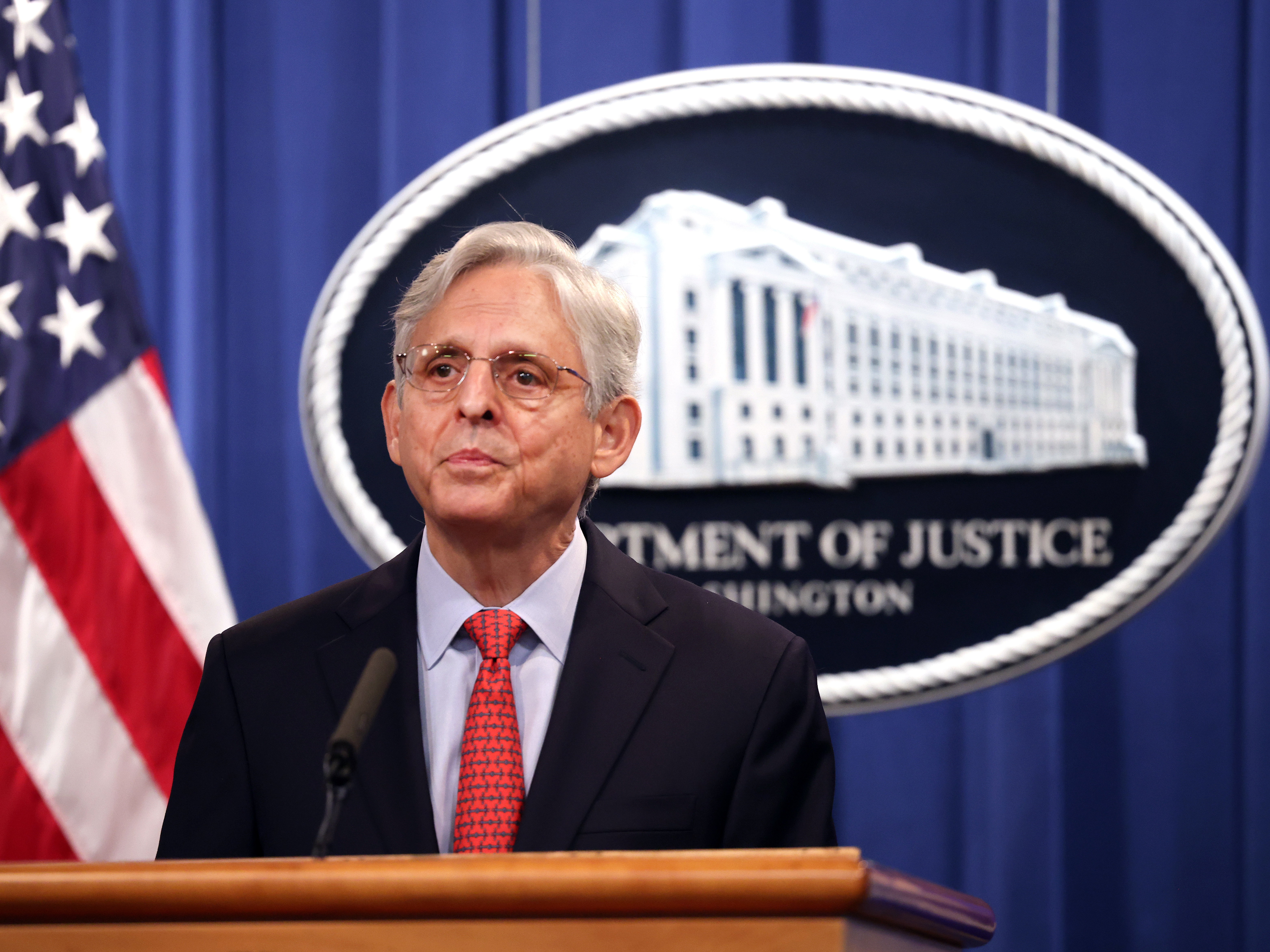 caption: Attorney General Merrick Garland at the Justice Department in August. The department is seeking a permanent injunction against the Texas law.