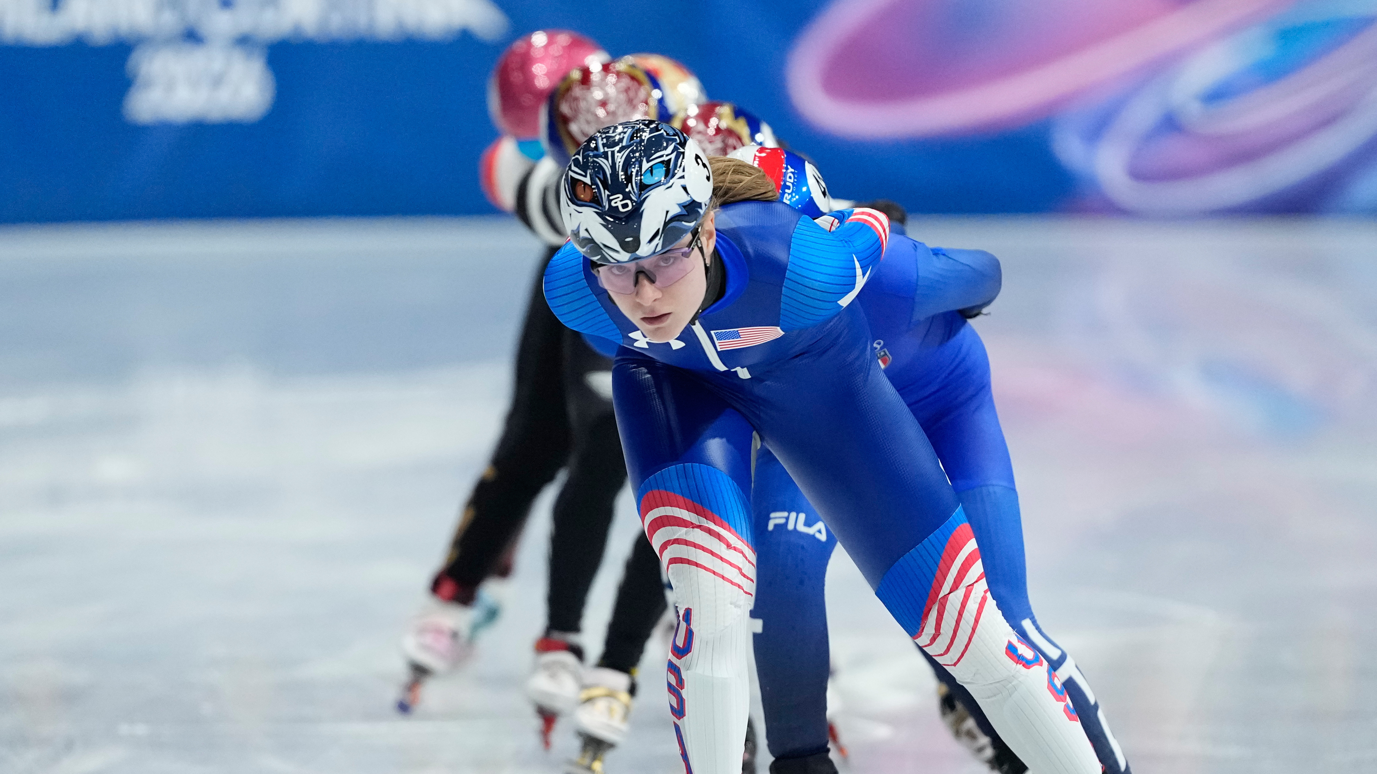 caption: Corinne Stoddard of the United States leads during a short track speed skating women's 1500 meters final at the 2026 Winter Olympics, in Milan, Italy, Friday, Feb. 20, 2026. 