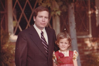 caption: Stephanie Hofeller stands with her father, Thomas, for a family photo in California during the 1970s. Republicans fought to stop computer files found on the redistricting expert's hard drives from going public — now Stephanie is sharing them online.