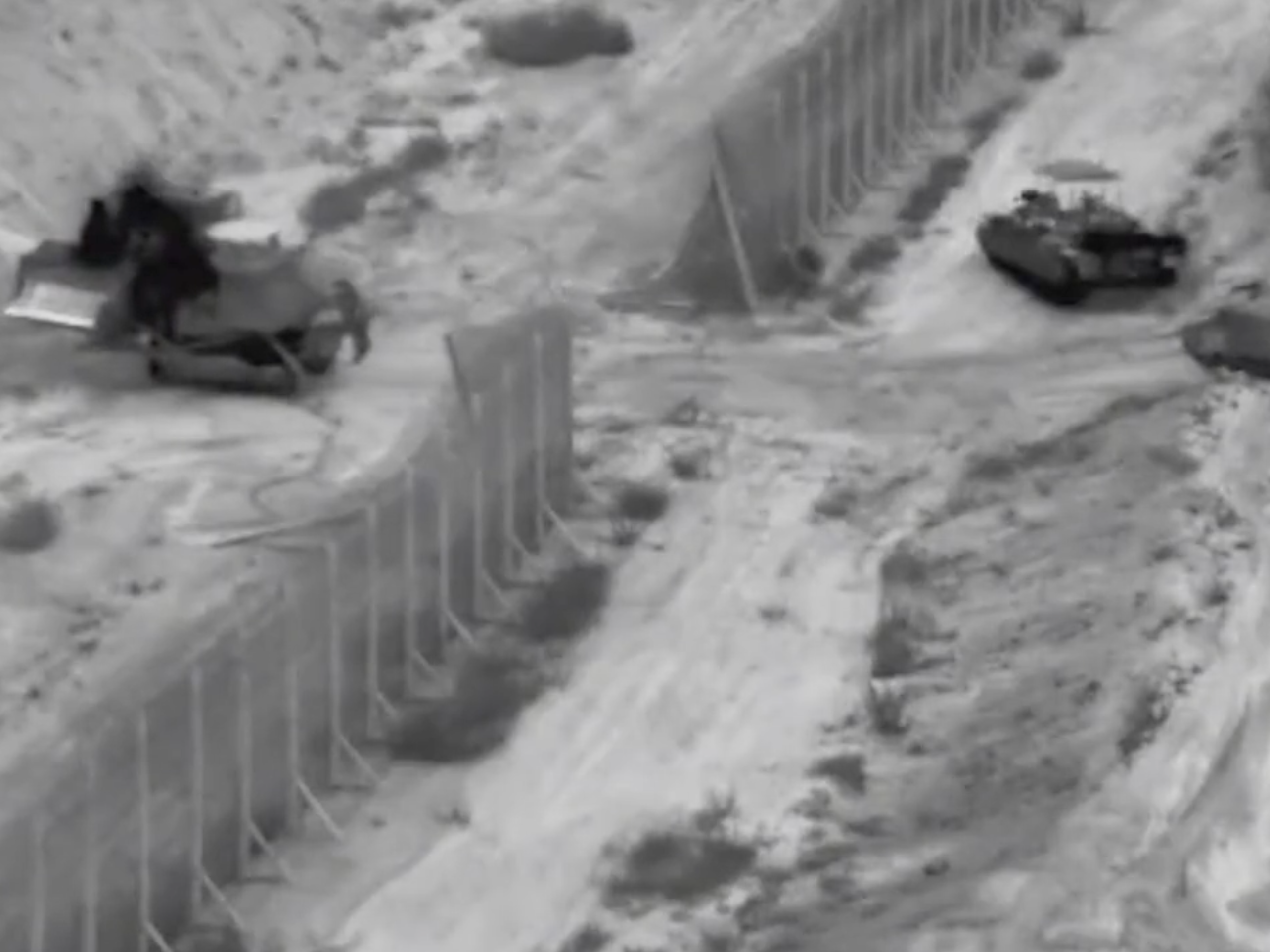 caption: A screenshot from a social media post by Israel's military appears to show Israeli tanks during a raid into northern Gaza.