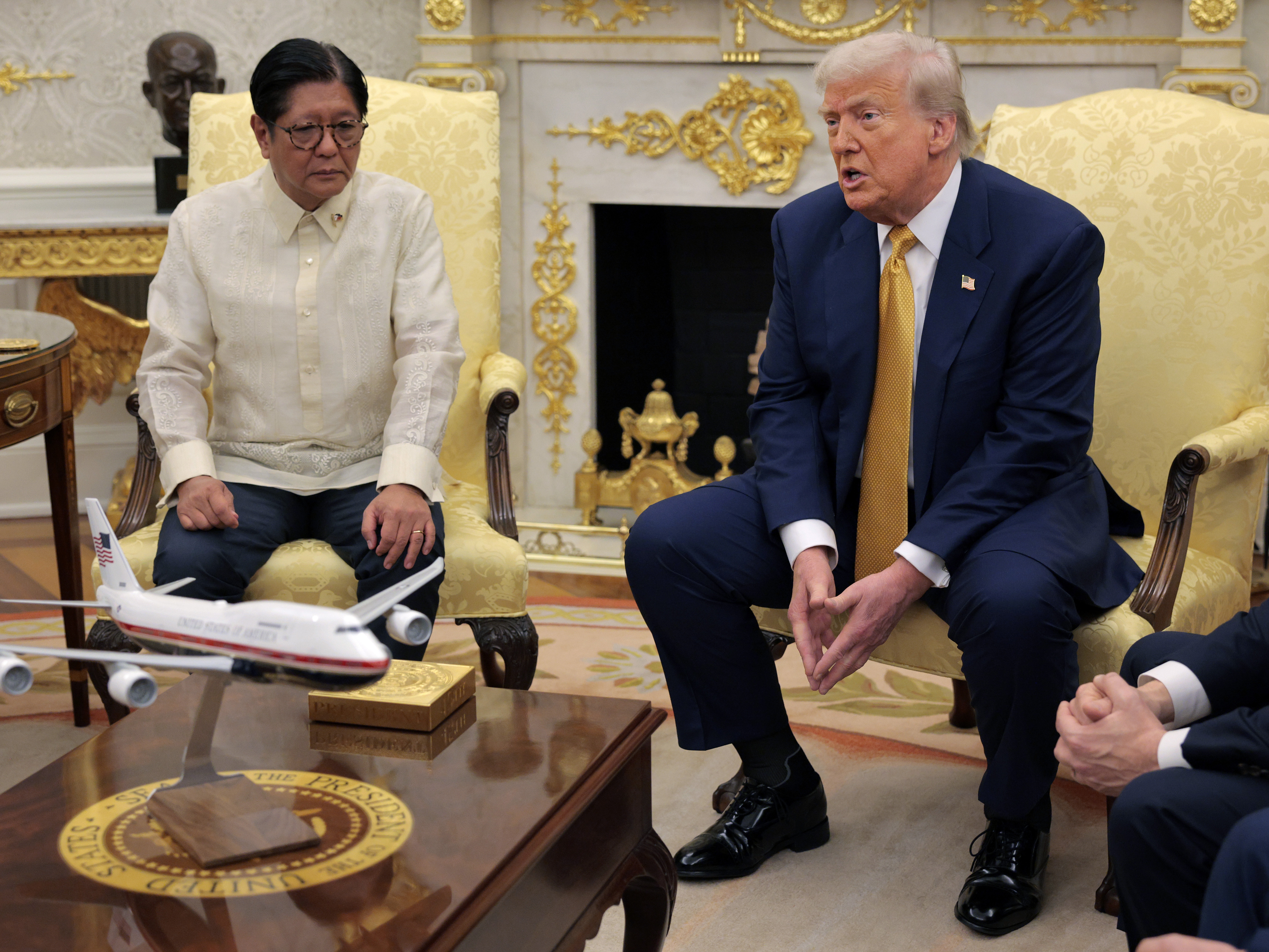 caption: President Trump meets with Philippine President Ferdinand Marcos Jr. in the Oval Office at the White House on July 22.